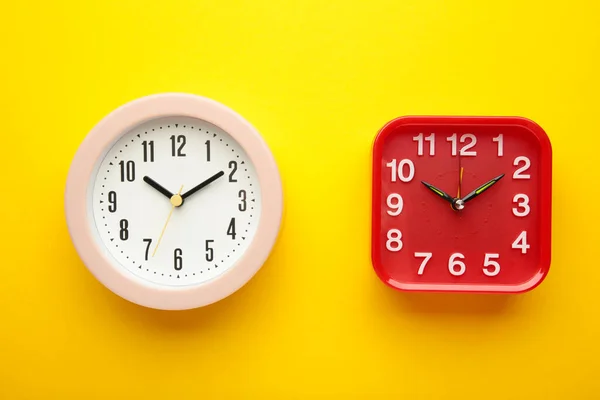 Pink Red Wall Clock Yellow Background Top View — Foto Stock
