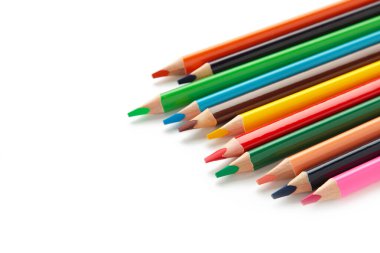 Color pencils isolated on white background. Close up. Top view