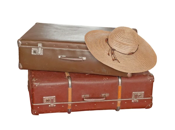 Porysowany starych walizkę z kapelusz kobieta na białym tle, ze ścieżką przycinającą zawarte. — Zdjęcie stockowe
