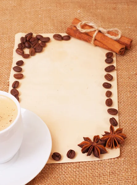 Frame of the old paper on burlap . With ( cinnamon and star anise ) — Stock Photo, Image