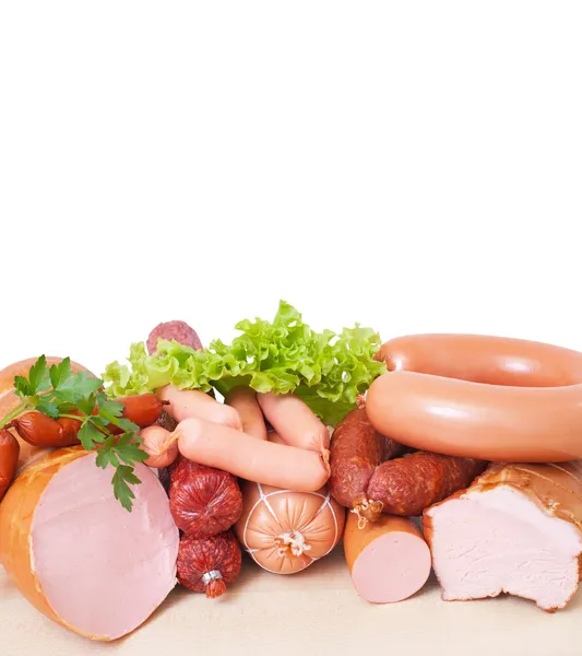 Meat and sausage . Isolated on a white background , with clipping path included — Stock Photo, Image