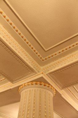 Fragments of columns and decorative ceiling clipart