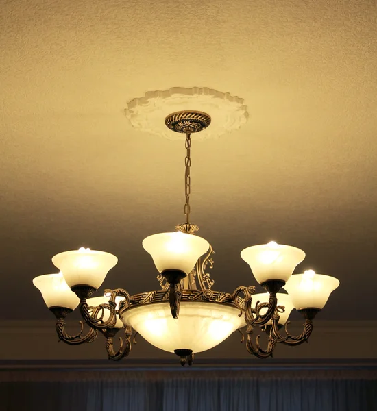 Bronze 8-lamp chandelier view from side — Stock Photo, Image