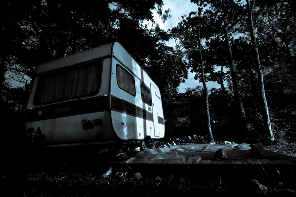 Vintage camper van at the night 스톡 이미지