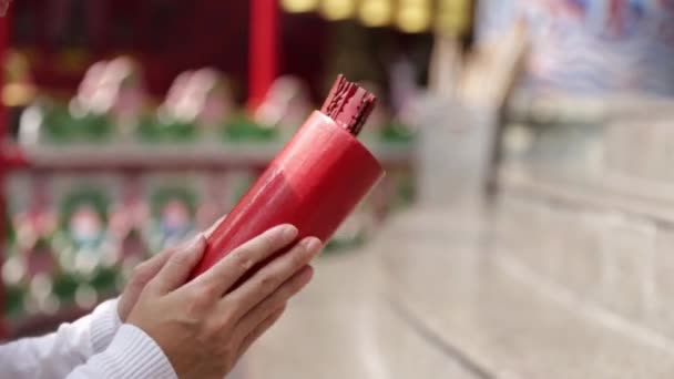 Close Asian Buddhist Hand Predicting Fortune Shaking Chi Chi Stick — Stock Video