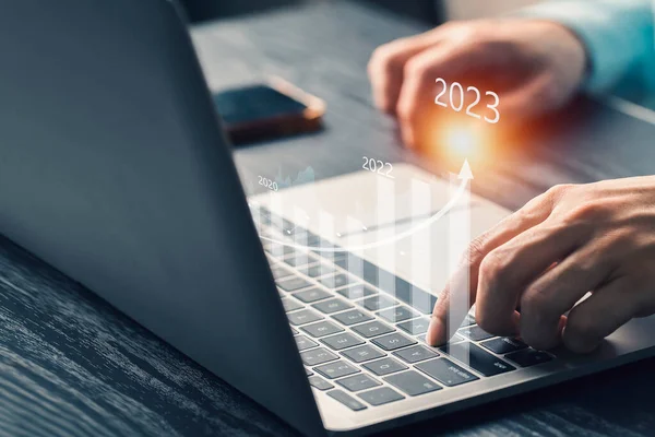 Concept of business finance and investment 2023 , Stock Market Investments growing with businessman investor 2023, management of Business finance background.