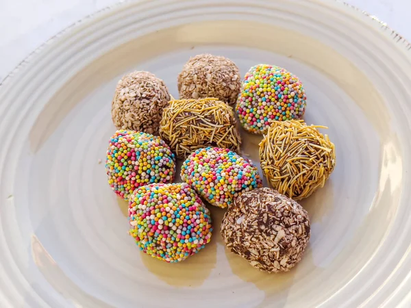 Energy balls. Truffles of dates, walnuts and cocoa . Healthy dessert, sugar-free