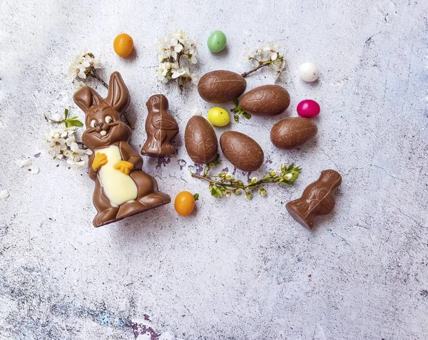 Chocolate Easter Rabbit and Colorful Easter Candy .Easter Greeting Card