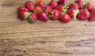 Fresh Strawberries on Wooden Background with Copy Space