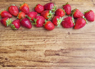 Fresh Strawberries on Wooden Background with Copy Space