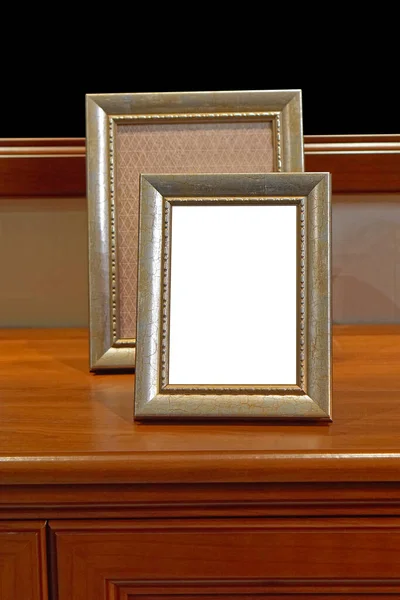 Two Golden Picture Frames Wooden Night Table — Stock Photo, Image