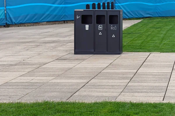 Black Recycling Bin Three Sorting Compartments Urban Park —  Fotos de Stock