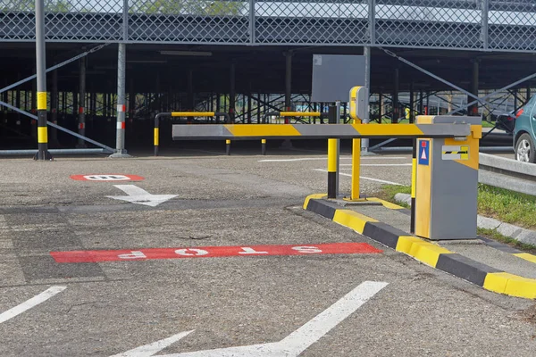 Parking barrier control ramp boom down exit