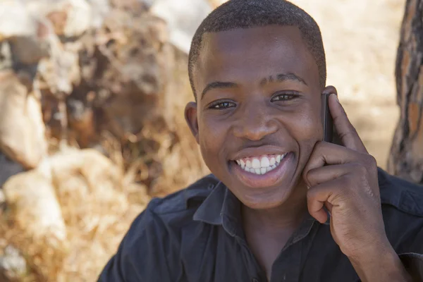 African boy on cell phone — Stock Photo, Image