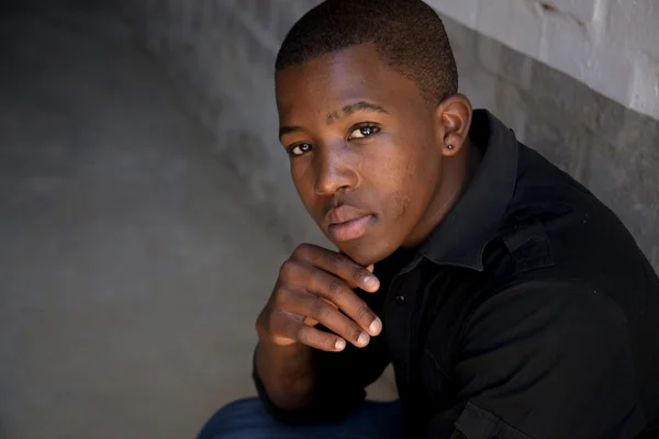 Young african boy looking to the camera — Stock Photo, Image