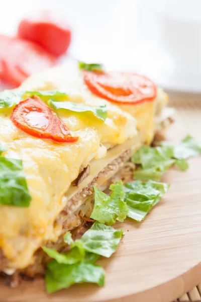 Vegetable lasagna with cheese and tomatoes — Stock Photo, Image