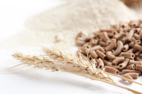 Wholemeal and its products, ears of wheat — Stock Photo, Image