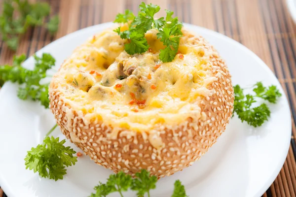 Bread roll baked with cheese and mushrooms — Stock Photo, Image