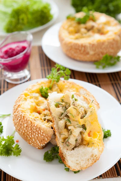 Bun stuffed with mushrooms and chicken with cheese — Stock Photo, Image