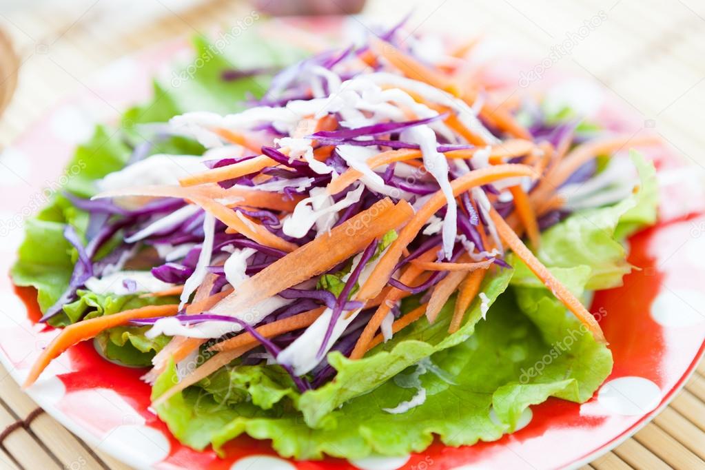 Cabbage-carrot salad and lettuce