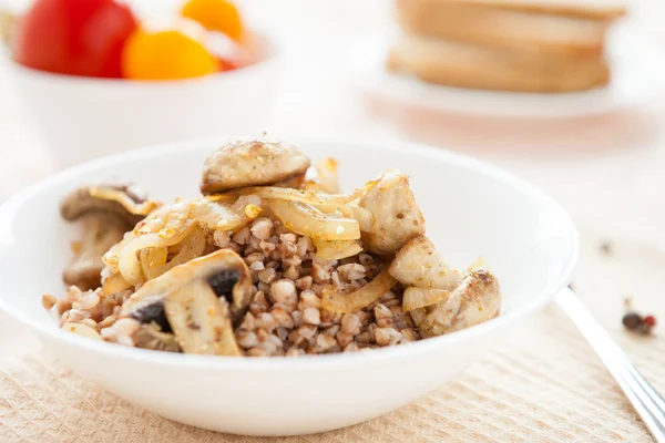 Buckwheat with fried mushrooms — Stock Photo, Image