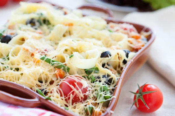 Baked in the oven the pasta with cheese — Stock Photo, Image