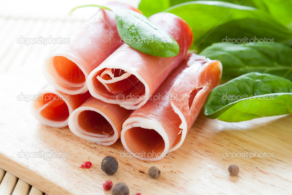 ham rolled into a tube and green spinach