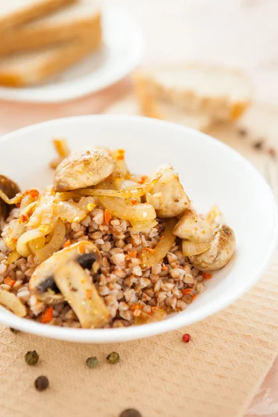 Fragrant buckwheat with mushrooms — Stock Photo, Image