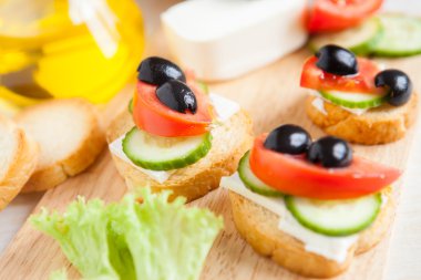 small canapés with feta and vegetables