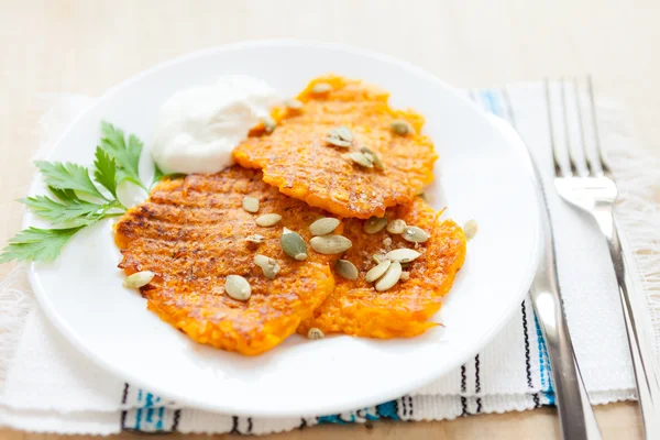 Pumpkin pancakes on a white plate — Stock Photo, Image