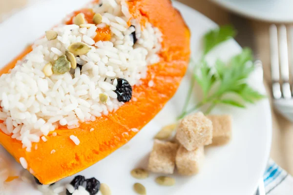 Sweet pumpkin with rice, cooked in the oven — Stock Photo, Image