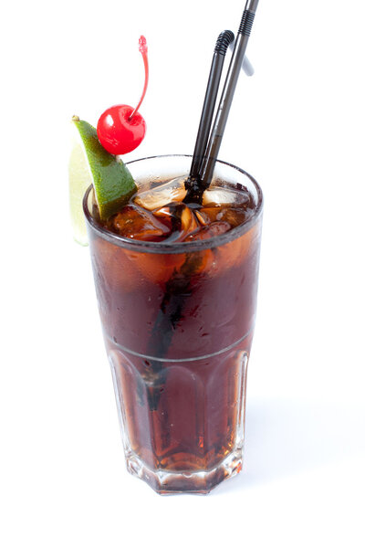 Coca-Cola with ice in a transparent glass
