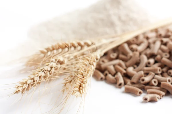 Handful of flour and pasta — Stock Photo, Image