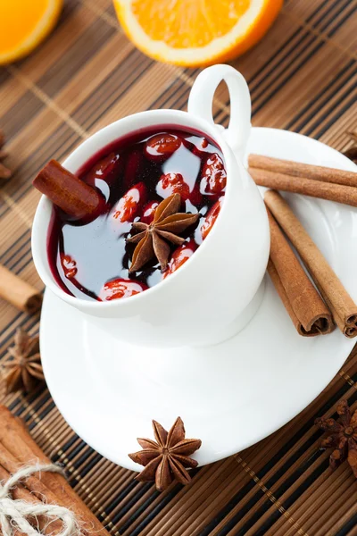 Glass of mulled wine with almonds — Stock Photo, Image