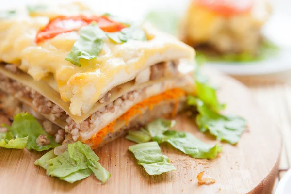 Traditional Vegetable lasagna on a wooden board — Stock Photo, Image