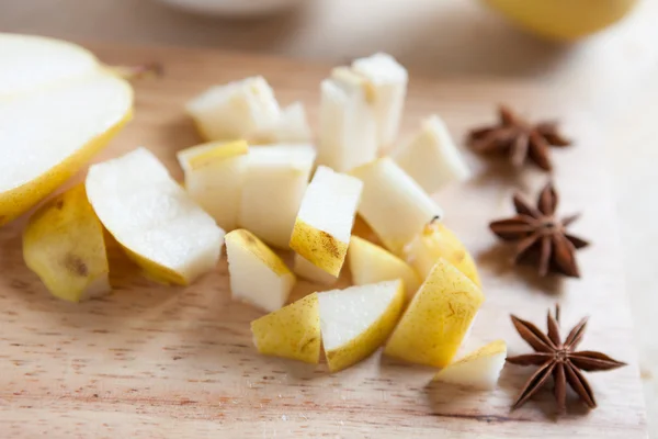 Slices of juicy pear and anise — Stock Photo, Image