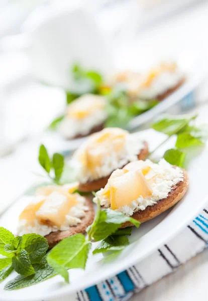 Flavored dessert pear jam and soft cheese — Stock Photo, Image