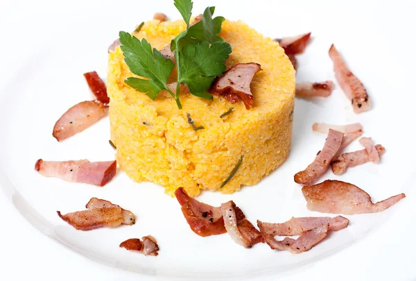 Сorn porridge with bacon — Stock Photo, Image