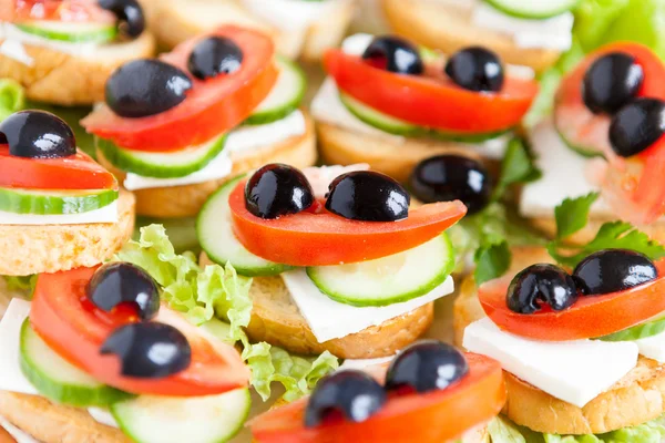 Sandwiches with soft cheese and olives — Stock Photo, Image