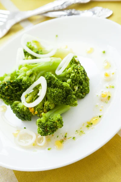 Braised broccoli in a light sauce — Stock Photo, Image