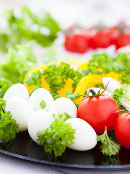 Fresh vegetables and quail eggs — Stock Photo, Image