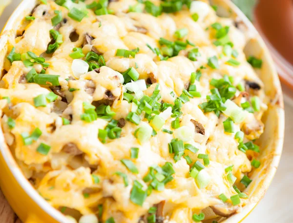 Mushroom casserole with cheese and green onions — Stock Photo, Image