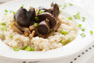 Arborio rice with mushrooms and parsnip clipart