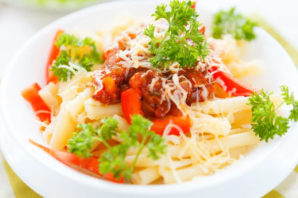 Pasta with vegetables and grated cheese — Stock Photo, Image