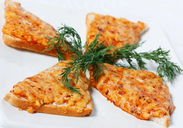 Hot sandwiches with cheese — Stock Photo, Image