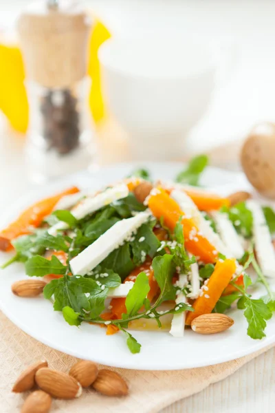 Salad with brynza and sweet orange pumpkin — Stock Photo, Image