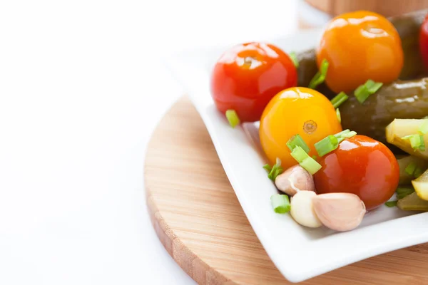 Salty tomatoes and cucumbers - home preservation — Stock Photo, Image