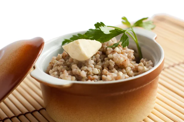 Buckwheat with butter in a pot — Stock Photo, Image