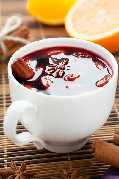 Traditional hot beverage from warm wine with spices — Stock Photo, Image