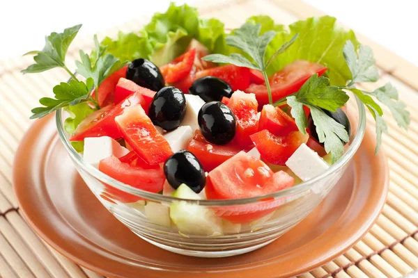 Freshly prepared Greek salad — Stock Photo, Image